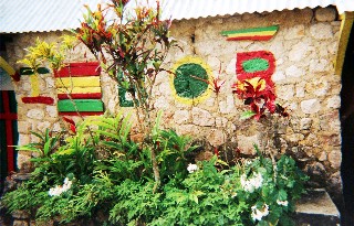 Photo of small room where Bob Marley lived as a child goes here.