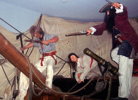 Photo of Captain Teach aka Blackbeard and his crew goes here.