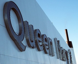 Photo of Queen Mary 2 logo on the ship's side goes here.
