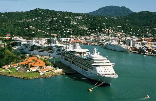 Photo of Castries harbor and cruise ships goes here.