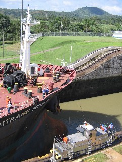 Photo of a petroleum tanker entering the canal goes here.