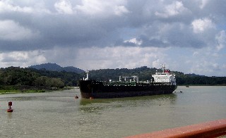 Photo of ship sailing through the canal goes here.