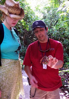 Photo of expedition guide with hermit crab goes here.