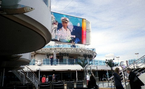 Photo of Gavin MacLeod as Captain Stubing on the big Movies Under the Stars screen onboard Royal Princess.*