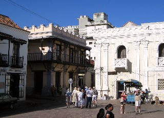 Photo of cathedral square with view to the Madame Agustine House goes here.