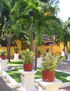 Photo of courtyard of Simon Bolivar hacienda goes here.
