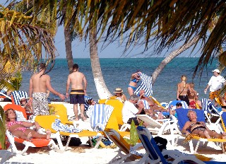 Photo of beach goers at Costa Maya goes here.