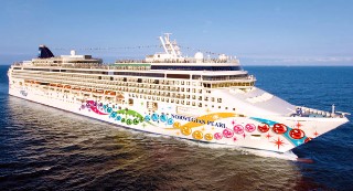 Photo of the exterior of Norwegian Pearl goes here.