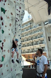 Photo of Jack on the rock climbing wall goes here.*